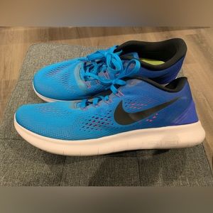 Nike Womens Free RN Running Shoes Blue Glow/Racer
Blue 831509-404 Size 10